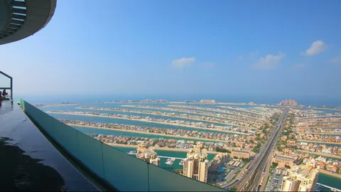 Infinity pool edge overlooking Palm Jumeirah from Aura Skypool